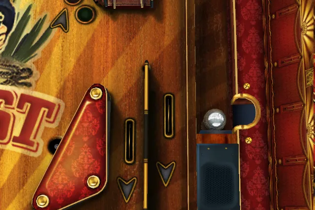 Wild West Pinball screenshot showing the lower playfield with a cactus by the rail, patterned red panels and the launch lane